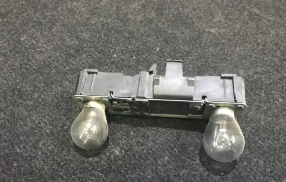 Renault Laguna I Tail light bulb cover holder