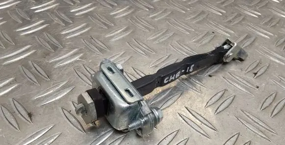 Front door check strap stopper