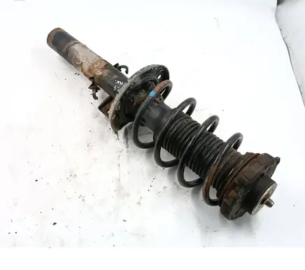 Volkswagen Fox Front shock absorber with coil spring 6Q0412331B