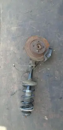 Dacia Logan II Front shock absorber with coil spring 