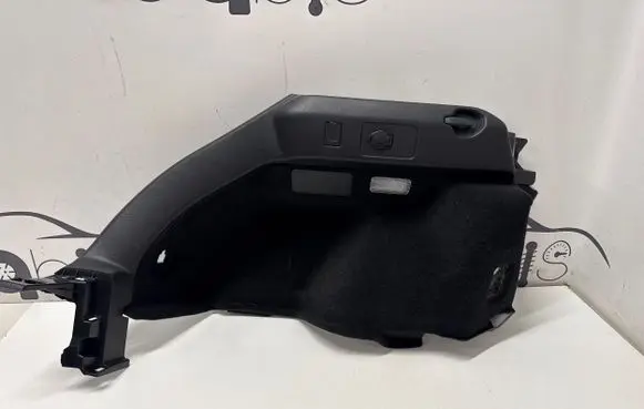 Trunk/boot lower side trim panel