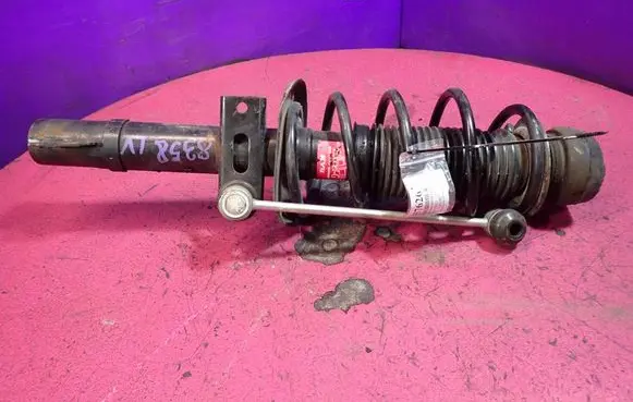 Skoda Fabia Mk2 (5J) Front shock absorber with coil spring