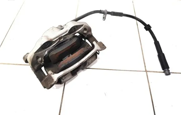 Peugeot 208 Front brake caliper 9836308080