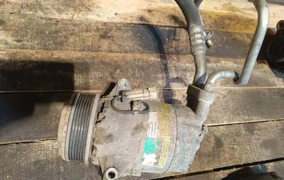 Opel Zafira B Air conditioning (A/C) compressor (pump)