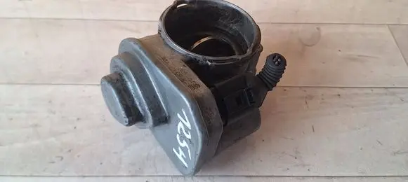 Volkswagen Golf V Throttle body valve 038128063L B92100087