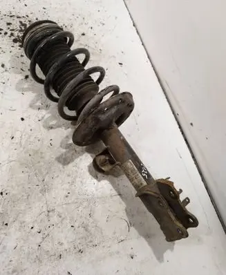 Opel Corsa D Front shock absorber with coil spring 13214358