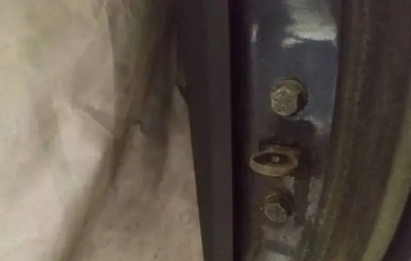 Rear door check strap stopper