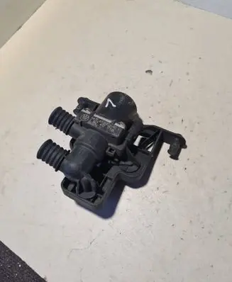 Coolant heater control valve