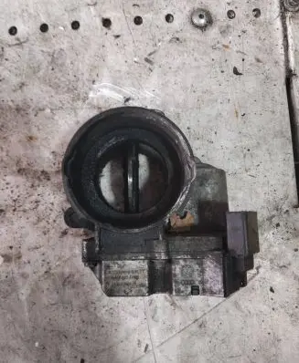 Volkswagen Touran I Throttle valve 03G128063J A2C53099815 2110070731
