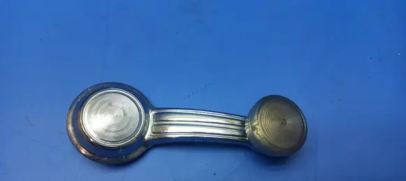 Oldsmobile Omega Rear door window winding handle 20037599