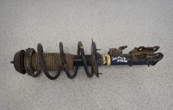 Front shock absorber with coil spring