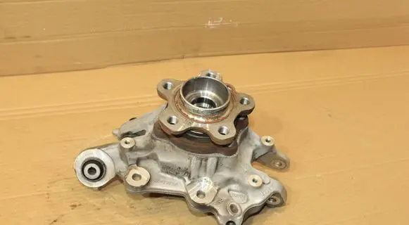 Rear wheel hub spindle/knuckle