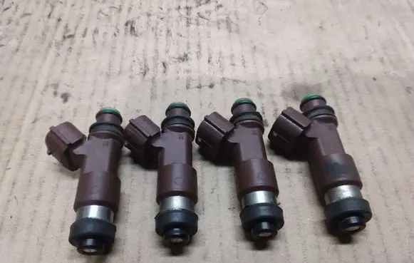 Subaru Legacy Fuel injectors set 146003006