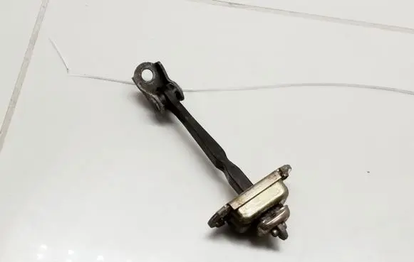 Nissan Primera Front door check strap stopper