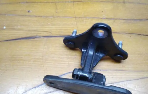 Front door lower hinge