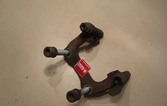 Volkswagen Golf V Brake caliper pad carrier rear 