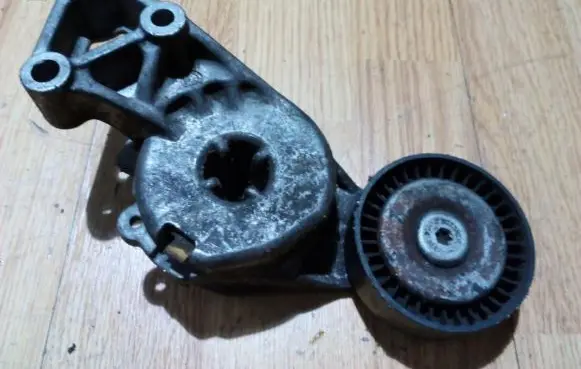 Generator/alternator belt tensioner