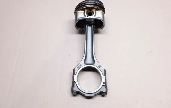 Piston with connecting rod