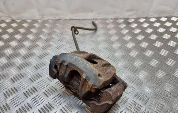 Toyota Corolla Verso E121 Front brake caliper 
