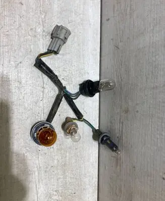 Nissan Micra K14 Tail light bulb cover holder