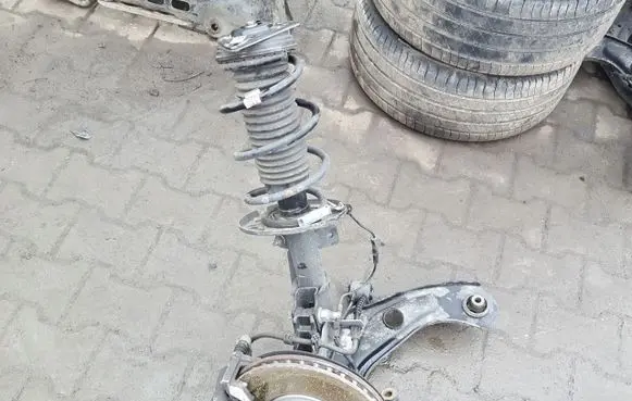 Front wheel hub spindle knuckle