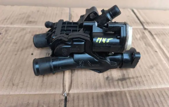 Thermostat/thermostat housing