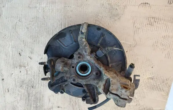 Front wheel hub spindle knuckle