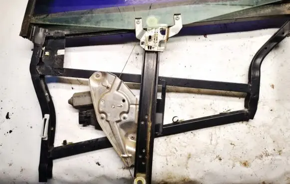 Sliding door window regulator with motor