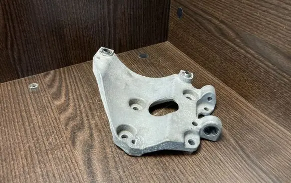 Volvo V50 A/C compressor mount bracket AV6Q10K360AA