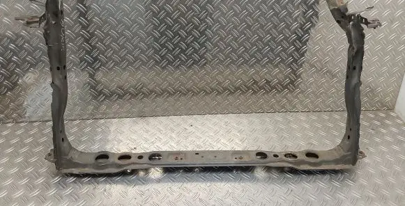 Radiator support slam panel
