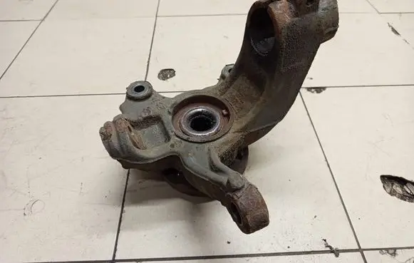 Front wheel hub spindle knuckle