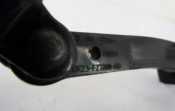 Jaguar XF Rear door check strap stopper 8X23F27200AB