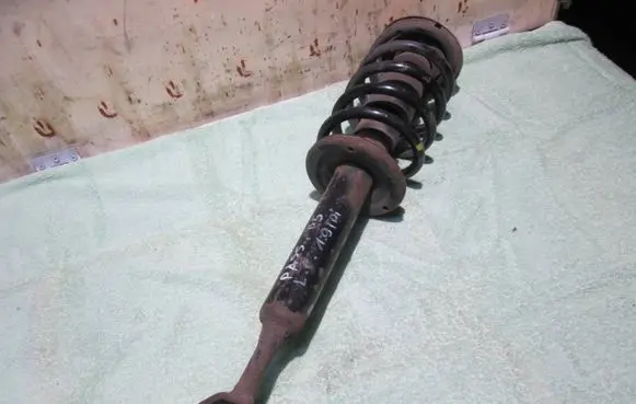 Volkswagen PASSAT B5 Front shock absorber with coil spring