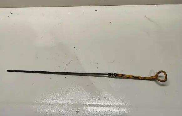 Oil level dip stick