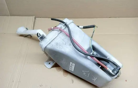 Nissan Micra Lamp washer fluid tank 