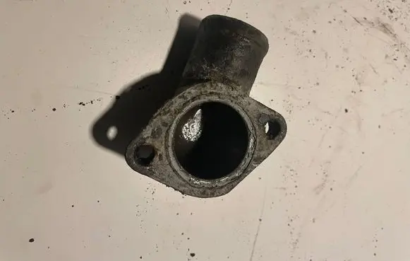 Thermostat/thermostat housing