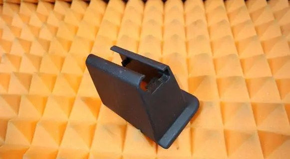 Front driver seat rail trim