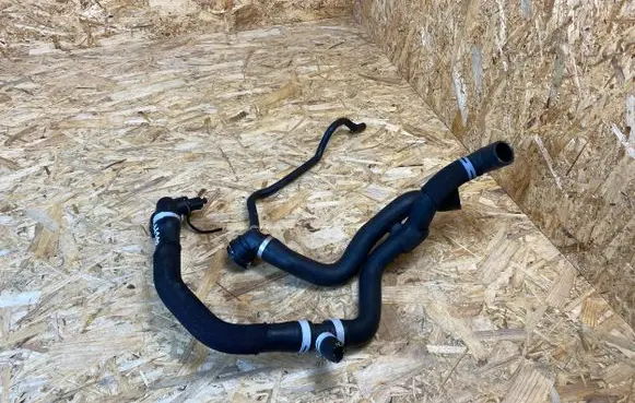 Volkswagen Golf VII Engine coolant pipe/hose 5Q0121049CR