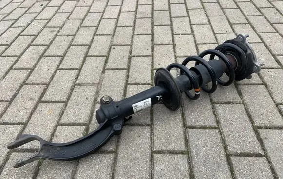 Front shock absorber with coil spring