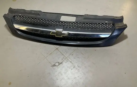 Chevrolet Lacetti Front bumper upper radiator grill 96547129