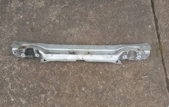 Top upper radiator support slam panel