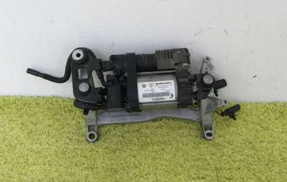 Volkswagen Touareg II Air suspension compressor/pump 7p0616006b