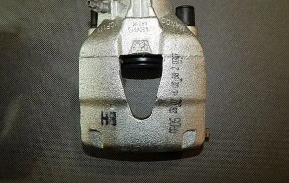 Volkswagen Polo V 6R Front brake caliper