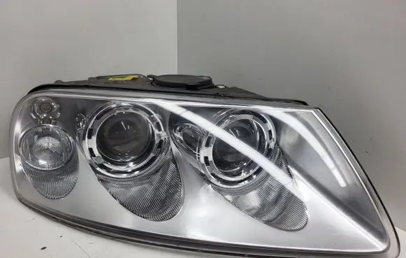 Volkswagen Touareg I Headlight/headlamp 7L6941016BK