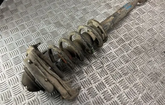 Front shock absorber with coil spring
