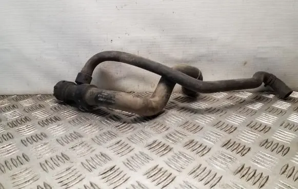 Volkswagen PASSAT B5 Engine coolant pipe/hose 8D0121049