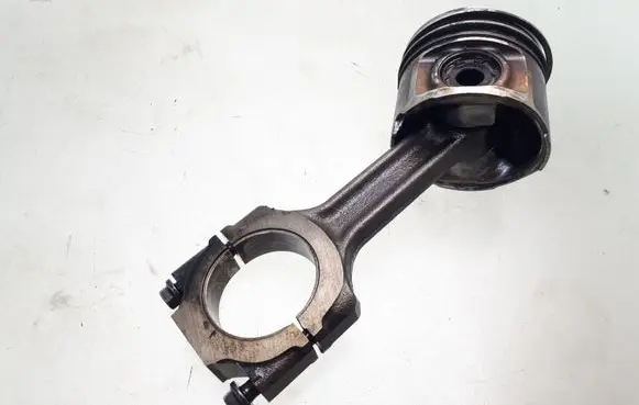 Piston with connecting rod