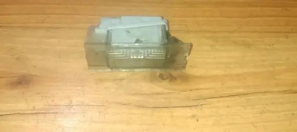 Renault Laguna I Number plate light 7700796162