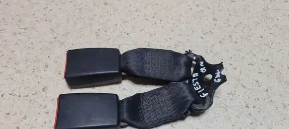 Middle seatbelt buckle (rear)