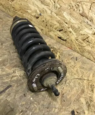 Nissan Navara D40 Front shock absorber with coil spring